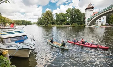Abteibrücke in Treptower Park With canoe and kayak on the Spree at the Abteibrücke in Berlin Treptow
