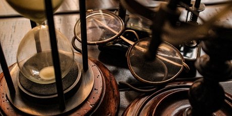 Hour glass with glasses Hour glass with glasses