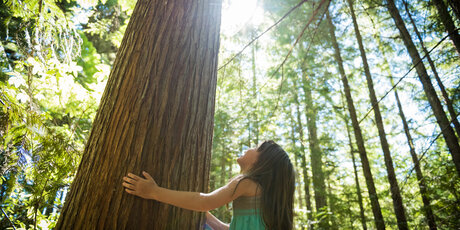 Young girl connecting with nature