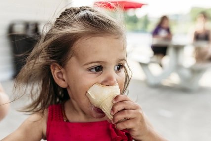 Child enjoying ice cream Child enjoying ice cream