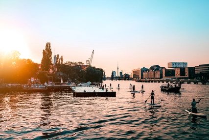 Stand Up Paddling at the Spree in Berlin Stand up paddling at sunset