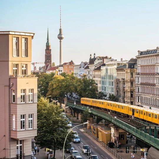 Elevated railway in Berlin Prenzlauer Berg Elevated railway on Schönhauser Allee, corner of Eberswalder Straße with a view of the television tower in Berlin Prenzlauer Berg