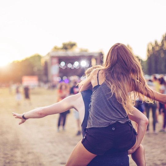 Open Air Festival Visitors celebrate at an open air festival