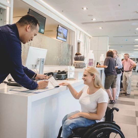 Barrier-free services at the Scandic Hotel Moving counter at Hotel Scandic Berlin for people in the wheelchair