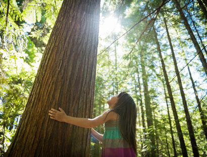 Young girl connecting with nature