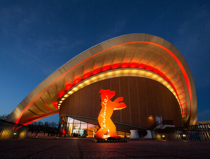 The illuminated House of World Cultures as a venue at the Berlinale 