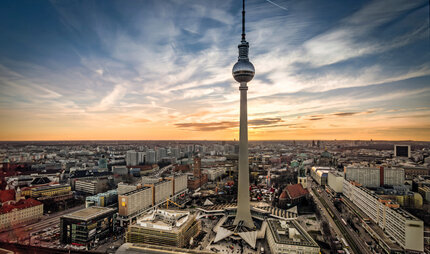 Berlin television tower at sunset as panorama