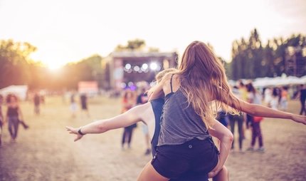 Open Air Festival Visitors celebrate at an open air festival