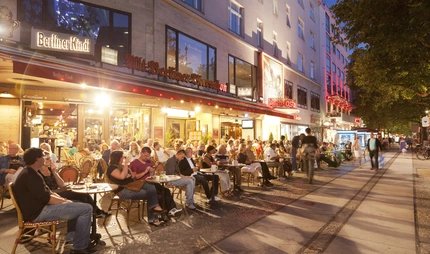 Summer evening at Kurfürstendamm in Berlin Summer evening at the restaurant Alt Berliner Biersalon at Kürfürstendamm in Berlin