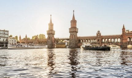 Oberbaumbrücke in Berlin Kreuzberg Boats on the Spree at the Oberbaumbrücke in Berlin Kreuzberg